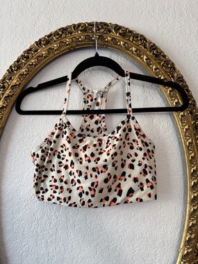 Women's Leopard Print Racerback Sports Bra - Cream/Black/Orange